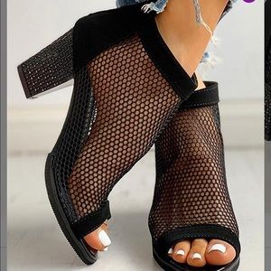 Black netted peep toe shoes